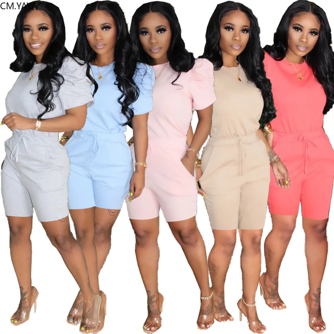 

Женский однотонный спортивный костюм CM.YAYA из двух предметов, футболка с лепестками, топ до колена, спортивные штаны для бега, спортивный кос...