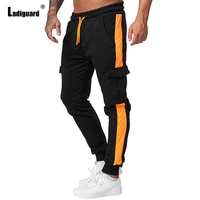 ladiguard mens cargo pants autumn fashion multi pockets hip hop trouser solid men patchwork outdoor skinny pant sexy bottoms