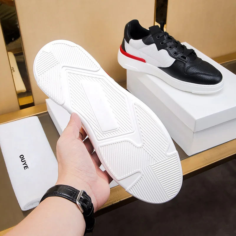 

2021 spring new leather men's shoes comfortable low-help sports and leisure board shoes tide shoes splicing small white shoes