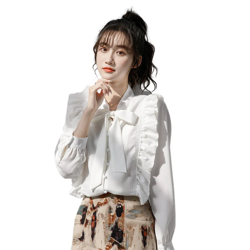 

White chiffon shirt female design sense French long-sleeved puff sleeve ruffled bow top