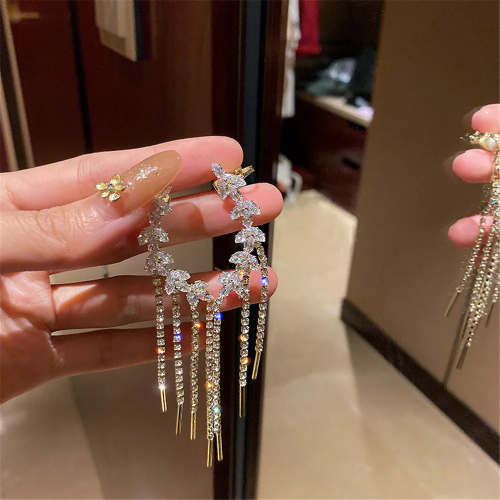 

Silver Olive Branch Rhinestone Earrings Shiny Tassel One-Piece Ear Bone Clip For Women Girls Elegant Temperament Earrings 2021