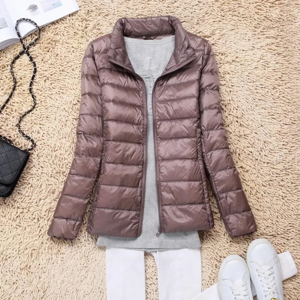 Женская куртка на белом утином пуху осенне зимняя облегающая теплая Сверхлегкий