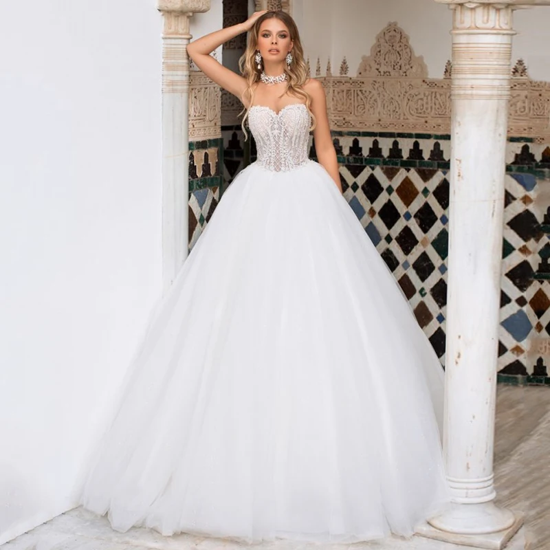 

2021 Ball Gown Wedding Dress Charming Strapless Appliques Backless Plus Size Tulle Sleeveless Bridal Gowsn
