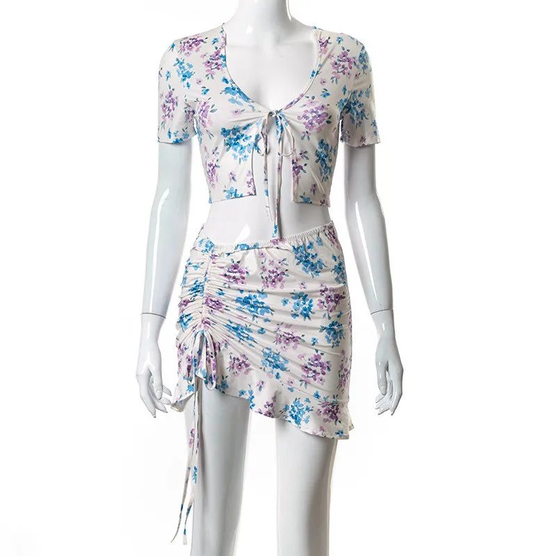 

Summer Casual 2 Piece Sets Women Print Bandage Sexy Short T-shirt And Mini Drawstring Skirt Matching Set Party Female Tracksuits