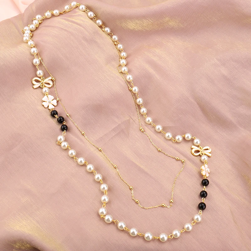Колье многослойное женское с жемчугом длинное ожерелье камелией и бантом модная