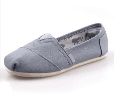 

2021 new European and American couple canvas shoes solid color flat low-top canvas shoes wholesale free shipping