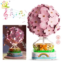 huiqibao 718pcs cherry blossoms hot air balloon music box rotating building blocks sakura with light bricks toys for children