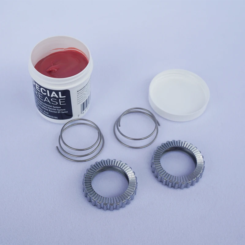 

DT Swiss 54t 60T Star Ratchet Kit: 2 star ratchets 2 springs and grease DT Swiss Hubs 54T