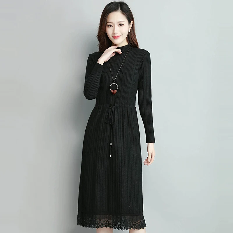 

Женское трикотажное платье-свитер с длинным рукавом и высоким воротником