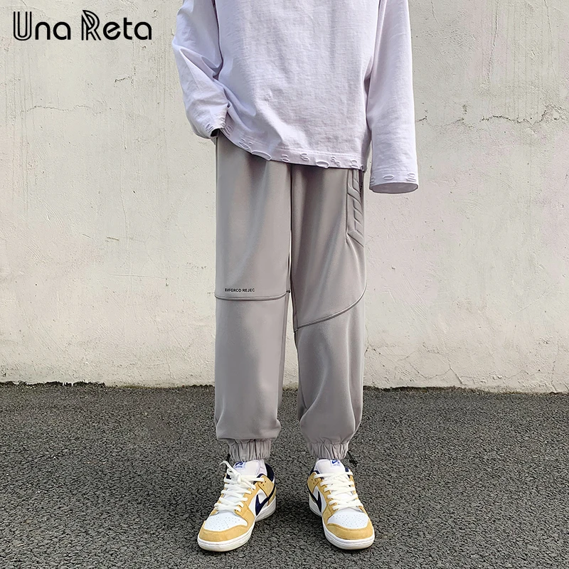 

Una Reta Men's Pants Spring 2021 New Fashion Loose Joggers Hip Hop Reflective strip Harem Pants Casual Sweatpants Man