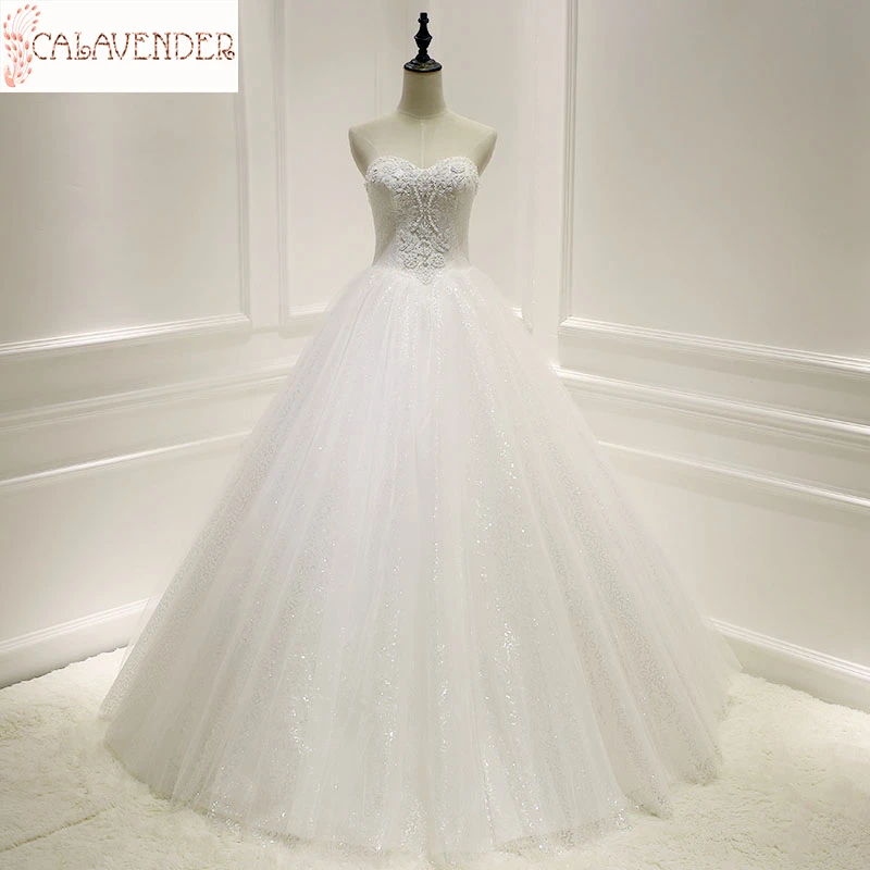 

Sparkly Tulle Beautiful Wedding Dresses Ball Gown Sweetheart vestido de noiva Pearl Beaded Floor Length Wedding Gown Bride Dress