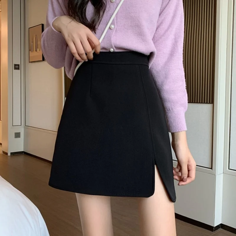 Женская короткая юбка с запахом черная тонкая трапециевидная высокой талией на