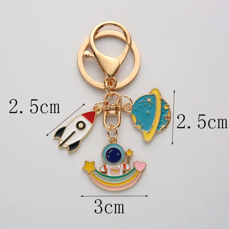 

Creative Metal Keychain Moon Cartoon Astronaut Rocket Star Car Key Chain Personality Bag Pendant for Kids Gift