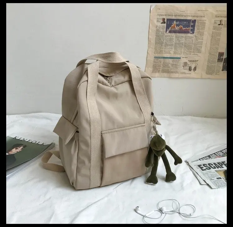 

Uniform wind solid color versatile casual multi-pocket student schoolbag college wind high capacity backpack