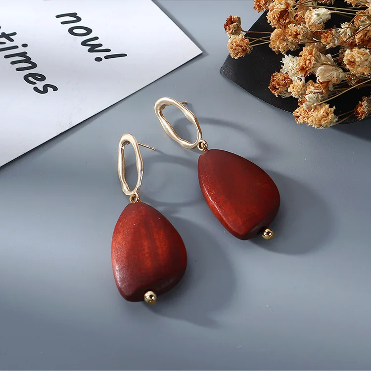 

JL Vintage Wood Stud Earrings Personality Water Droplets Shaped Hollow Earrings