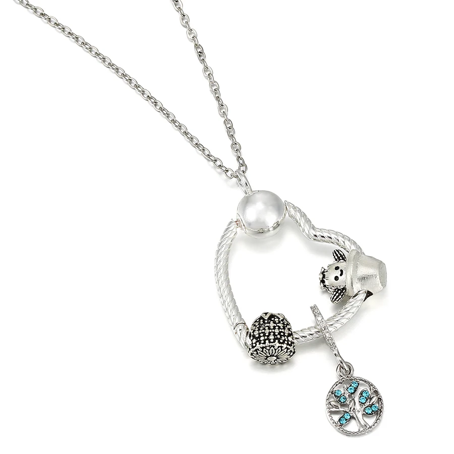 Женское колье с подвеской в виде сердца серебряного цвета | Украшения и