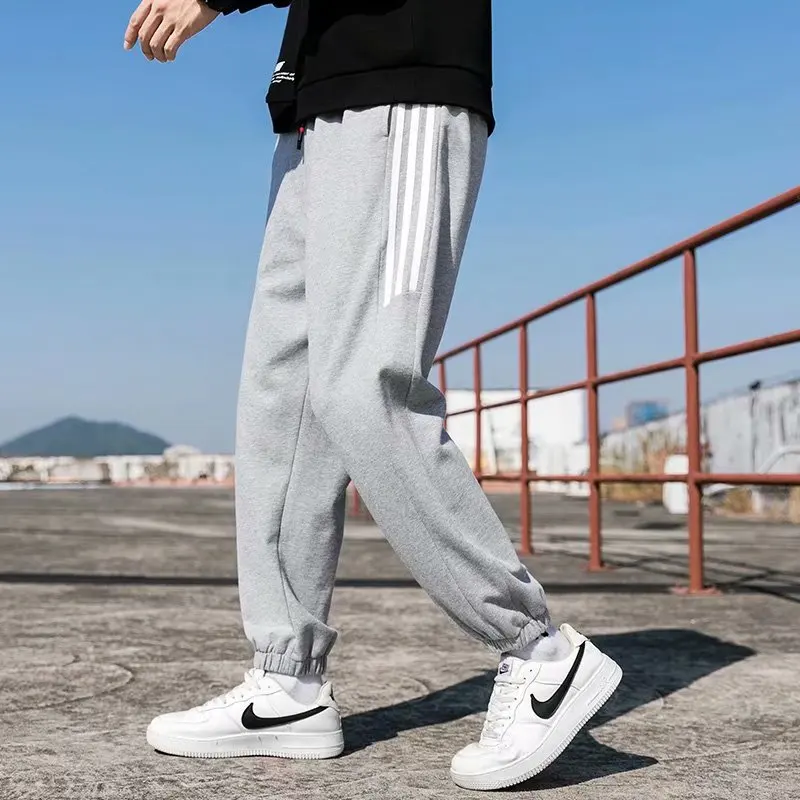 

Мужские удобные повседневные спортивные брюки с карманами, подходящие ко всему модные спортивные брюки 2021, спортивные брюки с полосками по ...