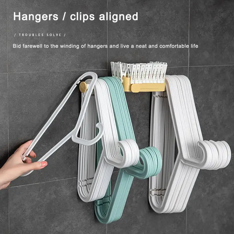

Foldable Clothes Hanger Hook Wall Sticking Storage Rack Hangers For Home Saving Space Bedroom Clothes Clip Collector Shelf