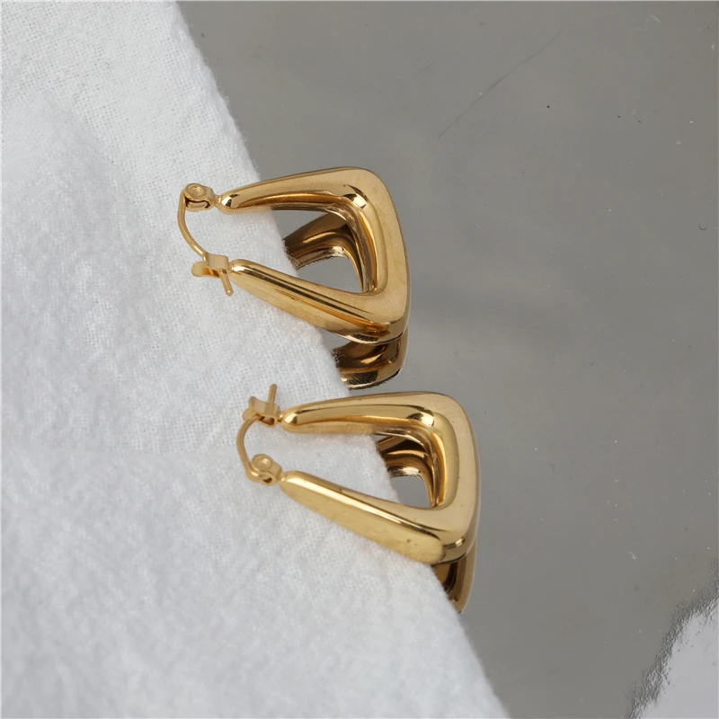 

Joolim High End PVD Plated Hollow Geometric Hoop Earrings Tredny Stainless Steel Jewelry