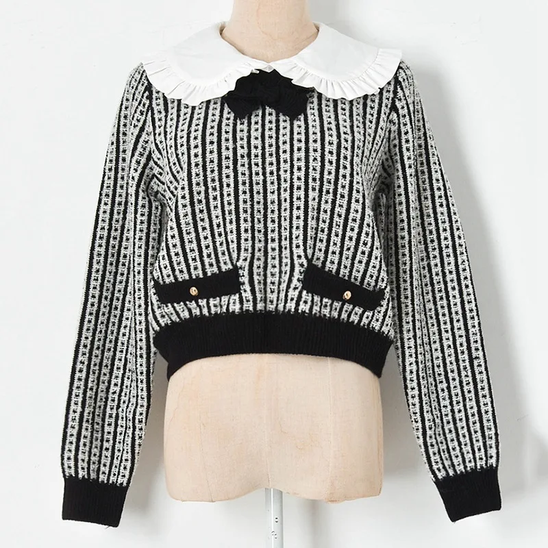 

Black and White Contrast Color Wood Ears Doll Neck Bow Knit Sweater Pullover Women Winter Sweaters 2021 Fashion Colorblock