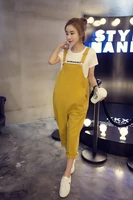 womens solid color cotton and linen series casual loose and comfortable trousers with buttons and pockets one piece suspenders