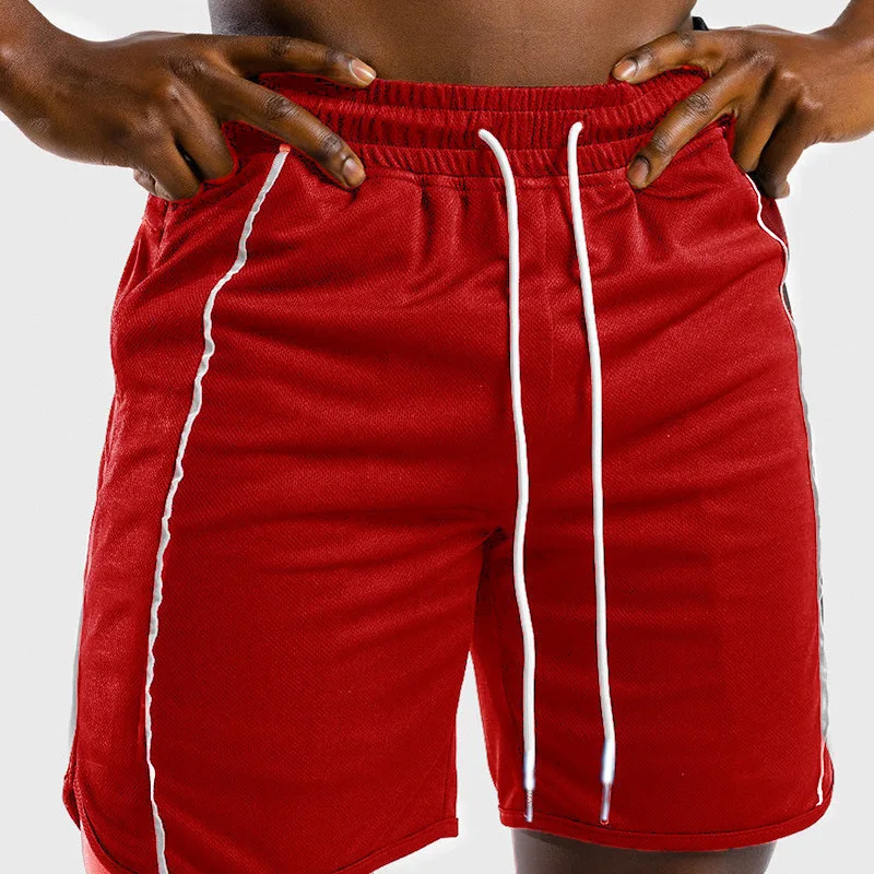 

2020 Summer Fashion Color Matching Youth Loose Large Size Sports Shorts Men's Five-point Beach Pants