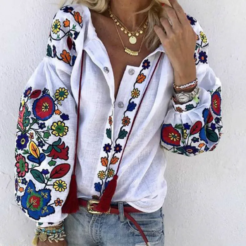 Женская блуза с пышными рукавами v-образным вырезом длинными и цветочным принтом