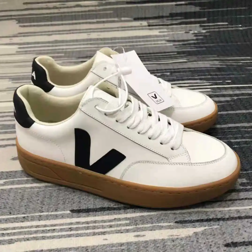 

Leisure travel sports shoes men and women 2021 spring walking running shoes white external brand designer leisure shoes