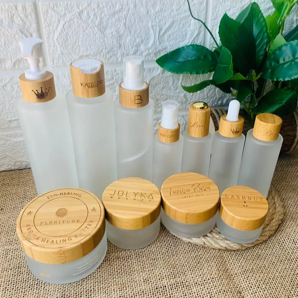 

30ml 50ml 100ml 120ml 150ml frosted glass bottles for cosmetics with bamboo lotion cap spray cap engraving logo