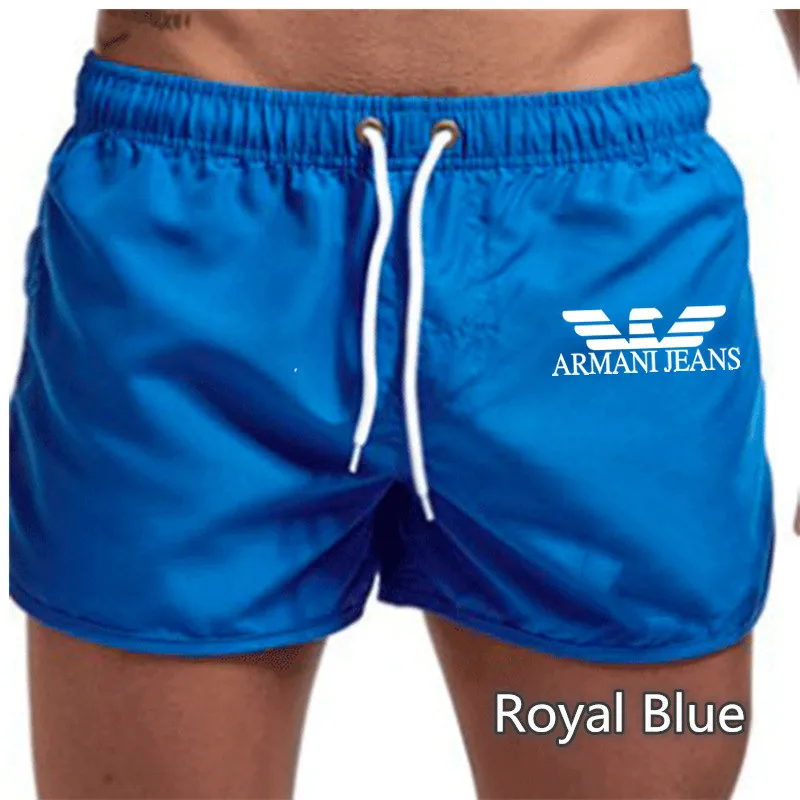 

2021 summer new casual sports shorts men's beach surfing shorts men's running training quick-drying fitness sports short male
