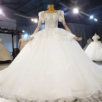 2021 puff short sleeve ball gown wedding dress with 200cm cathedral train see through top fancy beading elegant scoop bridal