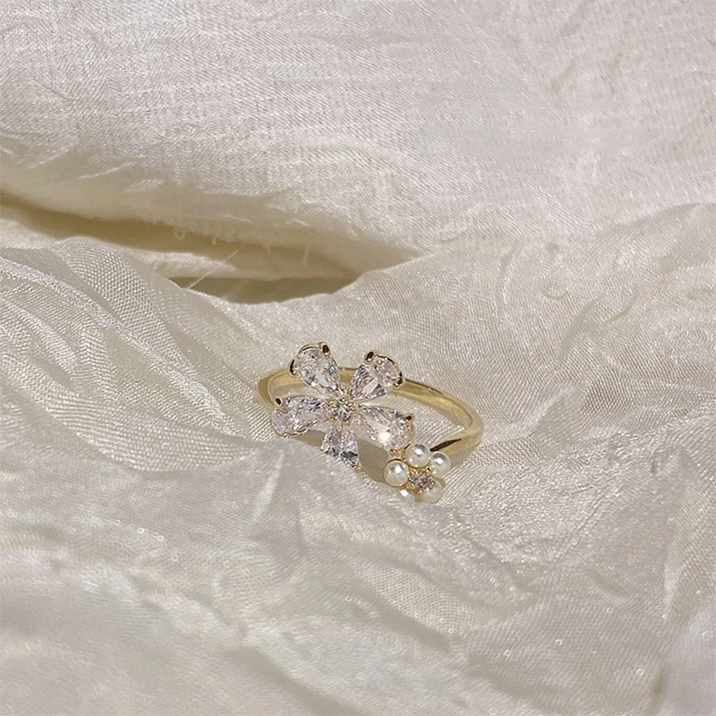 

MENGJIQIAO Korean Delicate Shiny Zircon Flower Rings For Women Girls Elegant Pearl Finger Knuckle Adjustable Rings Jewelry