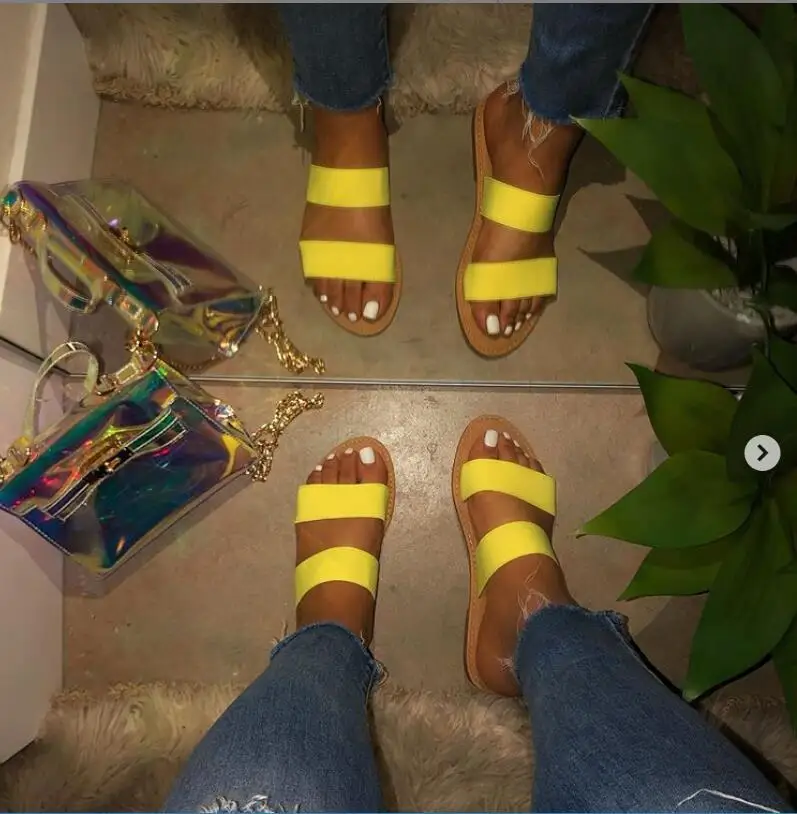Factory direct sales slippers new women's beach shoes PVC candy color sandals flat bottom ladies outdoor travel slippers