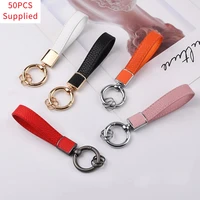 50pcs womens luxury metal leather keychain holder mens gadgets couple auto keyring accessories high quality car key holder