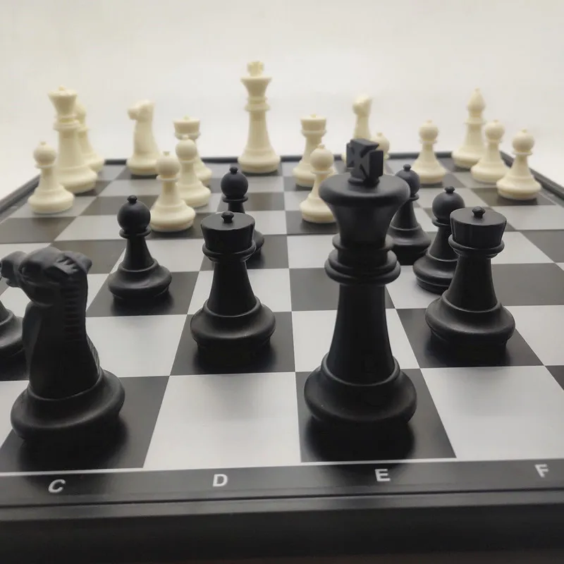 

1 set of black and white chess foldable magnetic plastic chess board game portable children's educational toy 2020