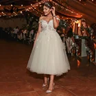 Женское свадебное платье с объемными цветами, открытыми плечами