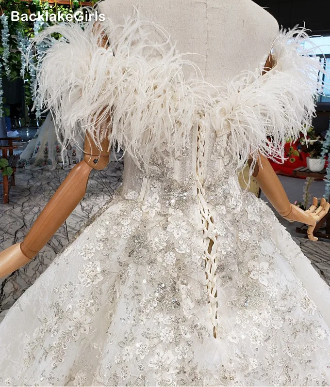 Высококачественные свадебные платья с перьями 2020 Новая мода Сексуальная Лодка