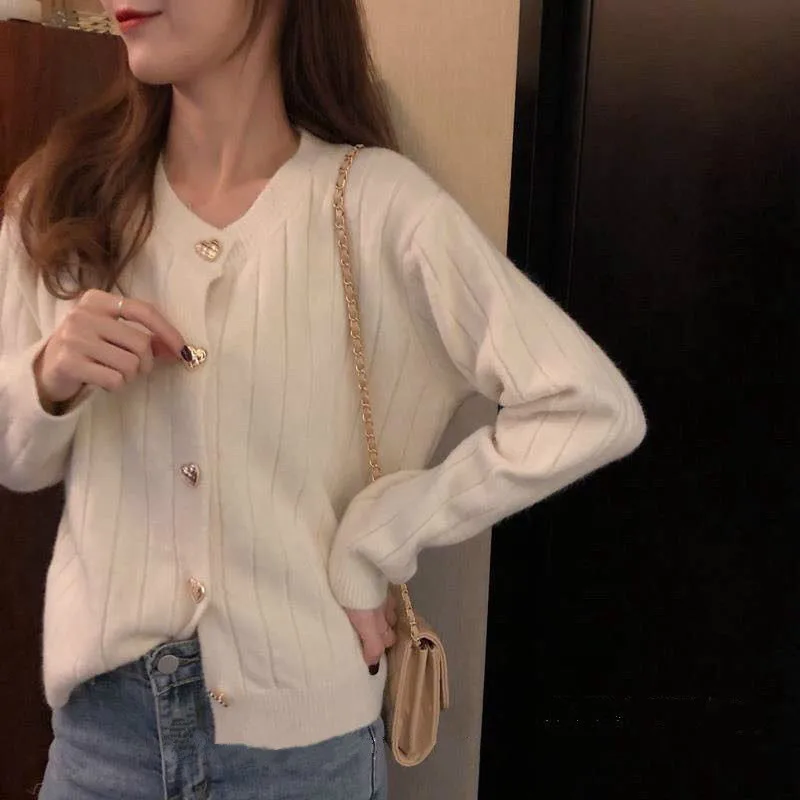 

2020 autumn and winter women's new coat short sweater cardigan fashion loose and thin striped sweater solid color long sleeves