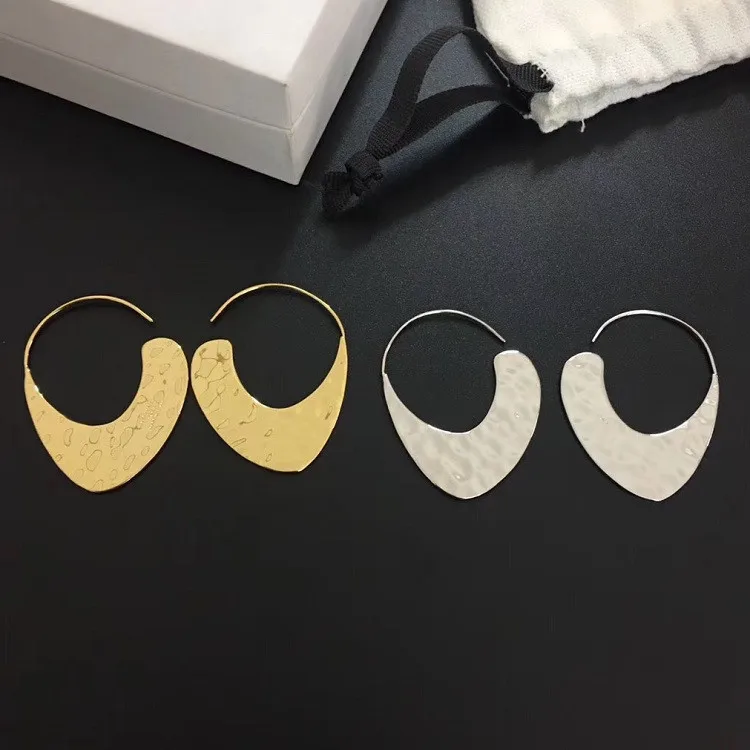 

European and American stars with simple personality earrings geometric smooth pieces of earrings brass plated earrings women