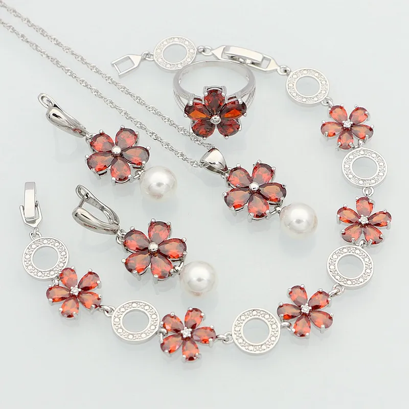 Женский ювелирный комплект из серебра 925 пробы с красным гранатом и белым