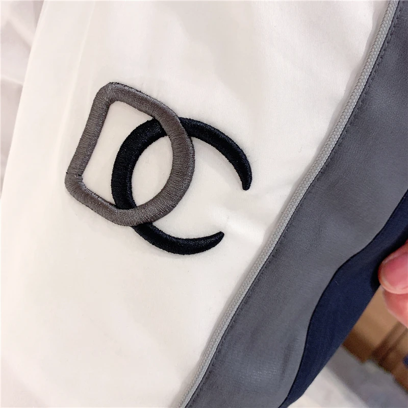 

European station summer new style individual character popular logo fashionable color splice small foot sport trousers male thin