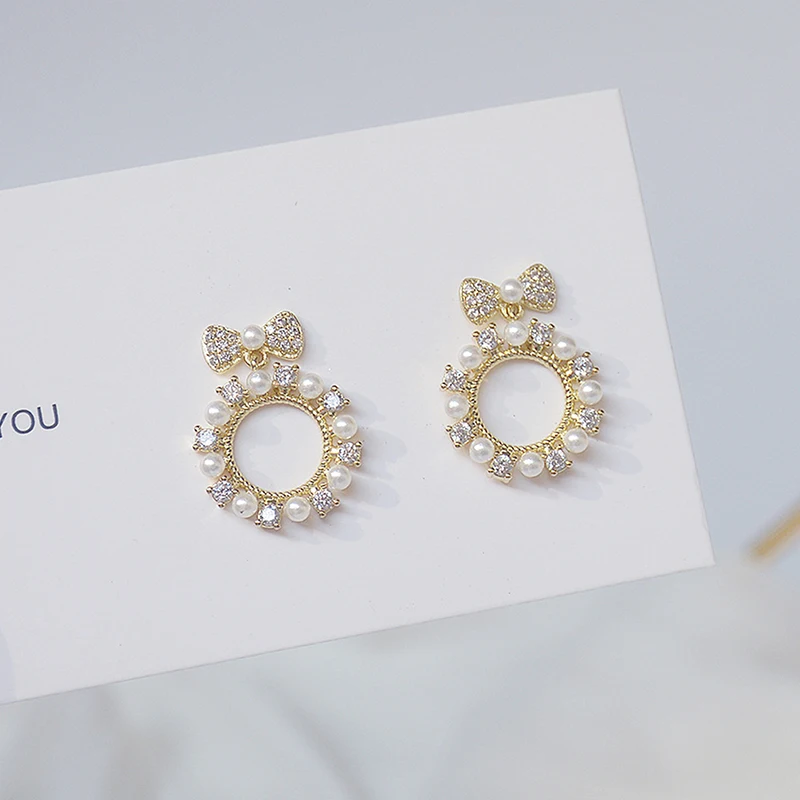 

Cute Tiny Imitation Pearls Bowknot Super Shine CZ Earring Romantic Bling Zirconia Temperament Stud Earrings Pendientes Jewelry