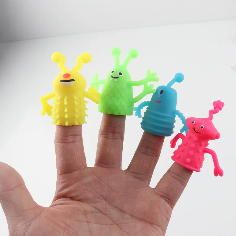 

4PCS/lot New Little monster TPR small animal finger doll soft rubber kindergarten hand puppet finger toy Funny toys