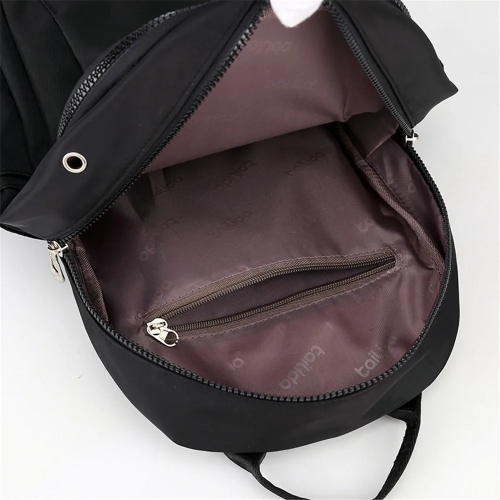 

Fashionable Quality Nylon Waterproof Travel Backpacks for Women 2021 New Solid Color Outdoor Sport School Bag for Ladies