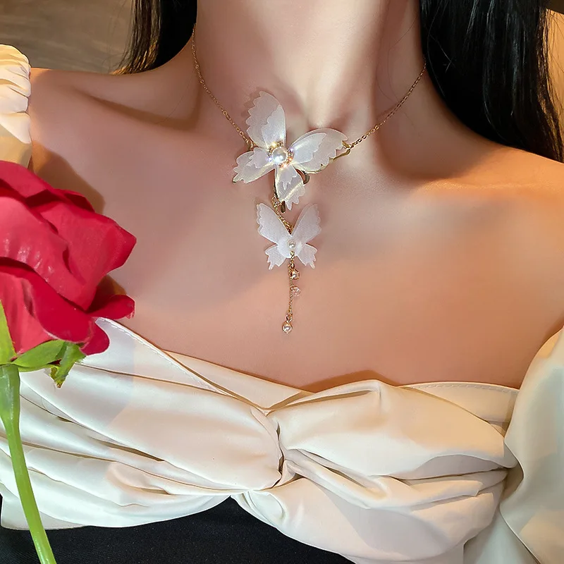 

Korean version of the East Gate fashion personality pearl set with diamond lace butterfly necklace choker chain super fairy girl