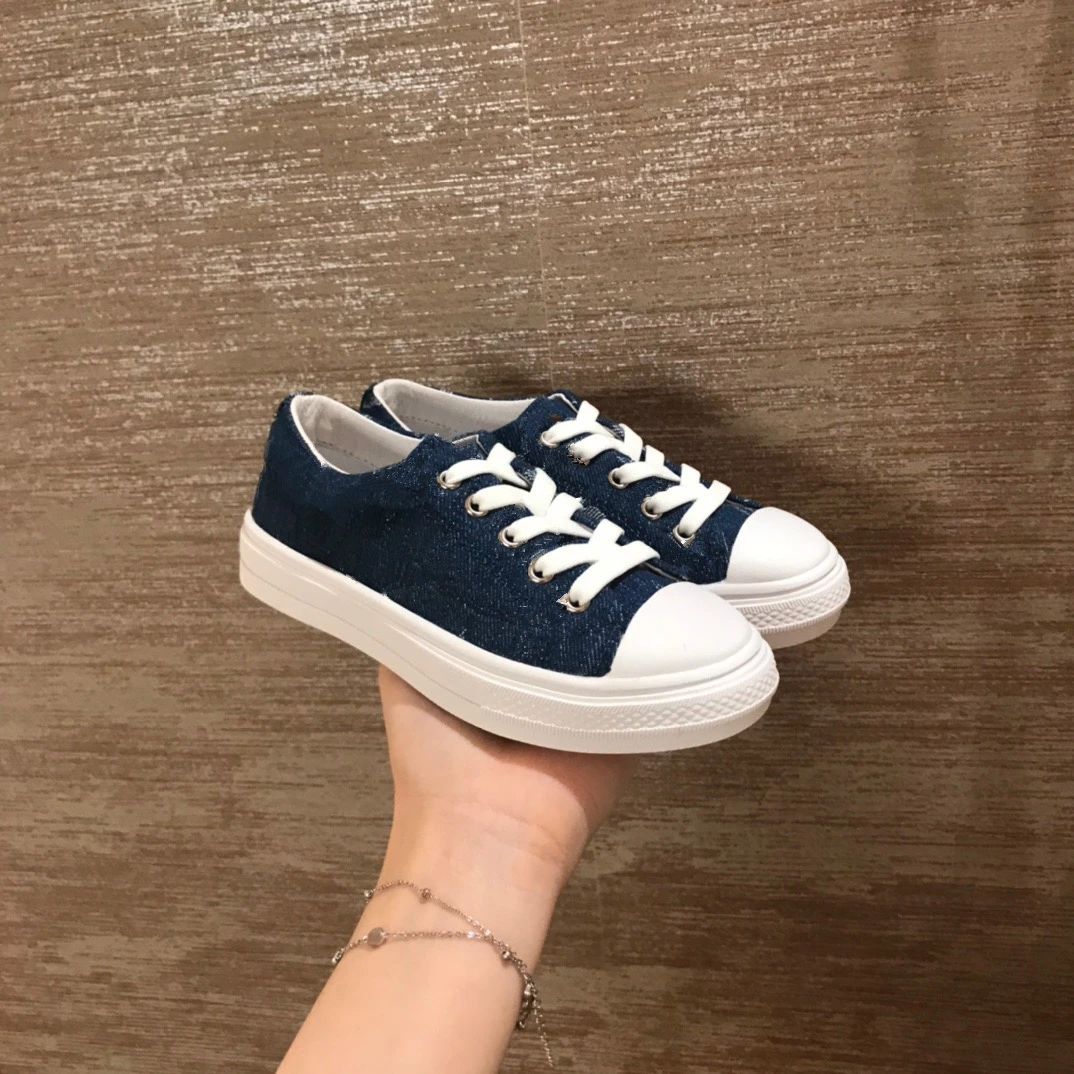 

Boys' and girls' low top casual shoes students' canvas shoes fashionable, breathable and versatile 2021 flat soled shoes