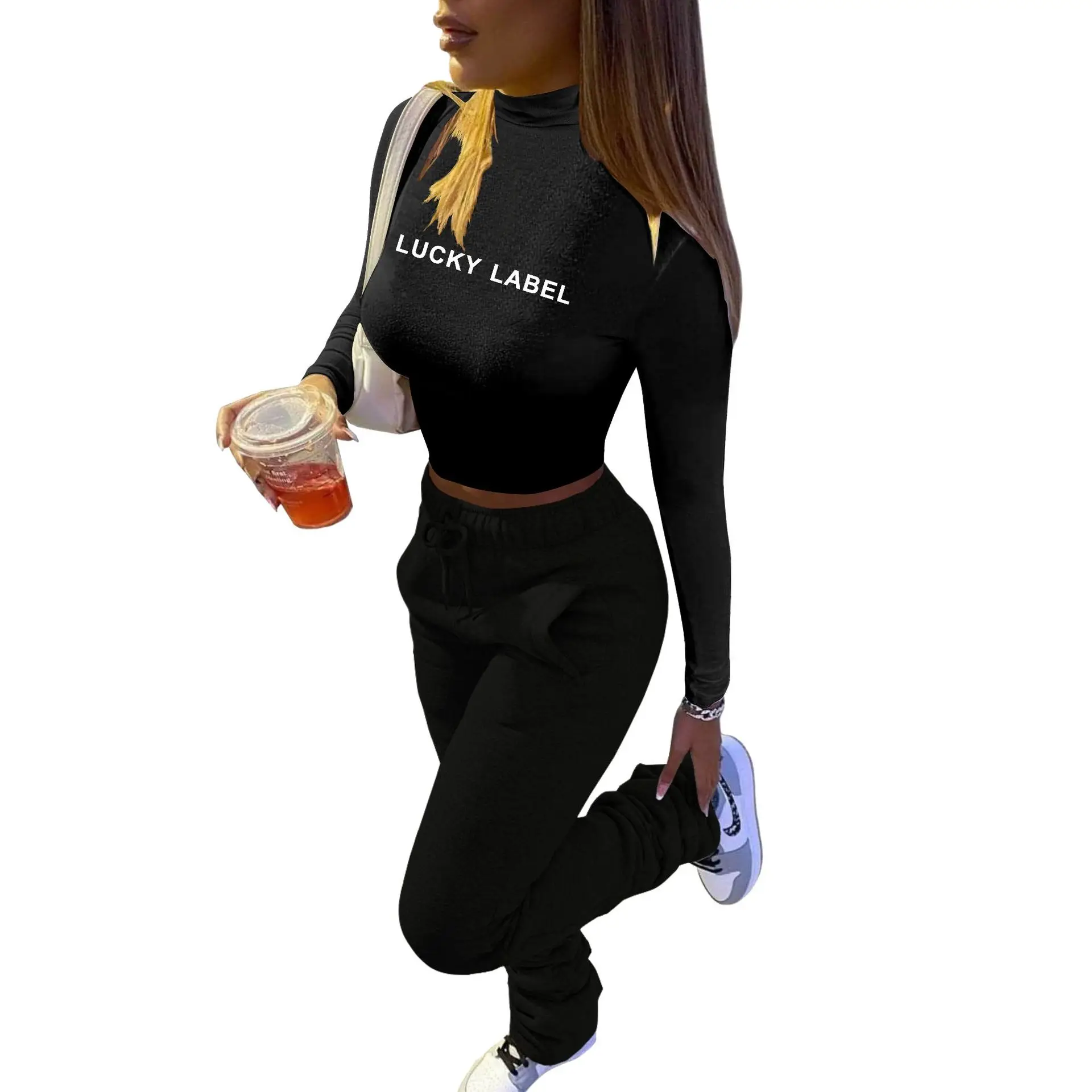 

Europe's new sexy solid color alphabet print sports two piece set slim o-neck long sleeve T-shirt and trousers women's set