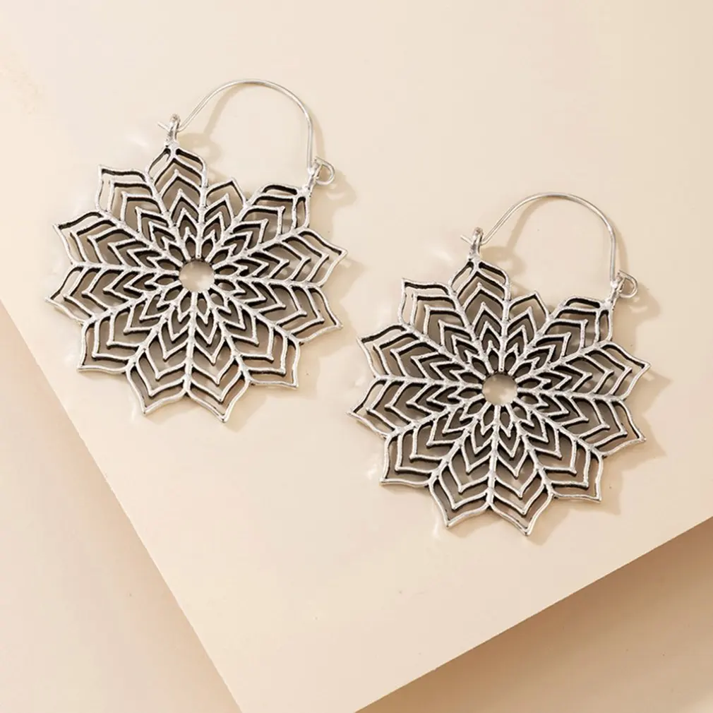 

Women's European And American Geometric Trend Retro Snowflake Earrings Fashion Personality Creative Bohemian Earrings Wholesale