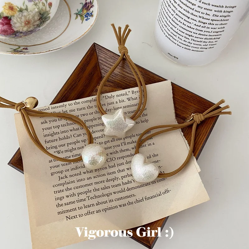 

2021 new fashion retro elegant pearl hair rope simple personality tie high elastic rubber band ladies accessories