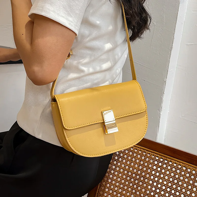 

Texture niche semicircle saddle bag female 2021 new fashion shoulder bag pu lock simple messenger bag